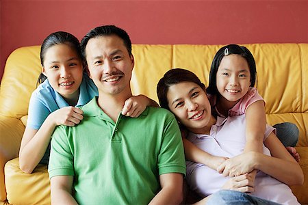 simsearch:656-01768177,k - Family of four smiling at camera, portrait Stock Photo - Premium Royalty-Free, Code: 656-01768291