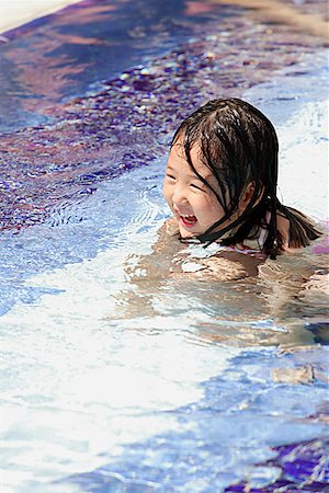 simsearch:656-01773586,k - Girl swimming in pool Stock Photo - Premium Royalty-Free, Code: 656-01769079