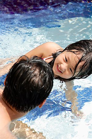 Father and daughter in swimming pool Stock Photo - Premium Royalty-Free, Code: 656-01769080