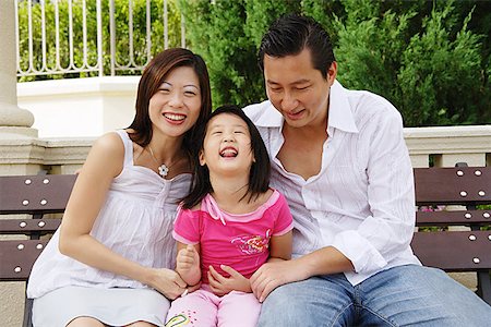 simsearch:656-01768177,k - Family with one child, sitting on bench Stock Photo - Premium Royalty-Free, Code: 656-01769461