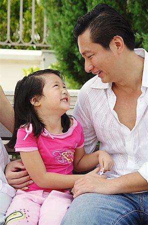 simsearch:656-01768177,k - Father with one child, sitting on bench, looking at each other Stock Photo - Premium Royalty-Free, Code: 656-01769463