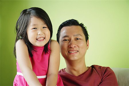 simsearch:656-01768177,k - Father and daughter, side by side smiling Stock Photo - Premium Royalty-Free, Code: 656-01769485