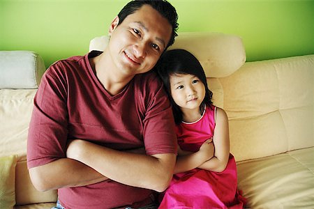 family condo - Father with one child, arms crossed Stock Photo - Premium Royalty-Free, Code: 656-01769511