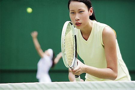 esprit d'équipe - Femmes jouant au tennis Photographie de stock - Premium Libres de Droits, Code: 656-01769528