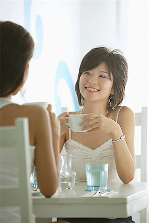 simsearch:656-01772966,k - Two women in cafe, having coffee Stock Photo - Premium Royalty-Free, Code: 656-01770314