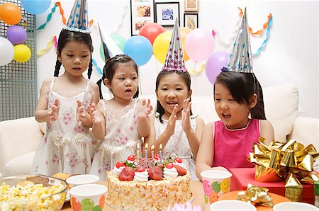 east asian ethnicity girl cake - Four girls celebrating birthday Stock Photo - Premium Royalty-Free, Code: 656-01770508