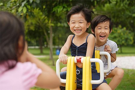 simsearch:656-01773586,k - Young girls in playground, playing on seesaw Stock Photo - Premium Royalty-Free, Code: 656-01770554