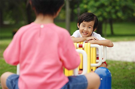 simsearch:656-01773586,k - Two girls on a seesaw Stock Photo - Premium Royalty-Free, Code: 656-01770578