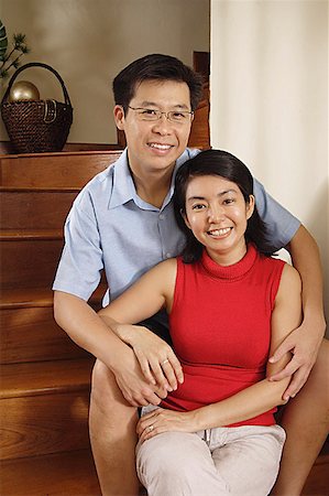 simsearch:656-01768177,k - Couple at home, sitting on stairs Stock Photo - Premium Royalty-Free, Code: 656-01770930