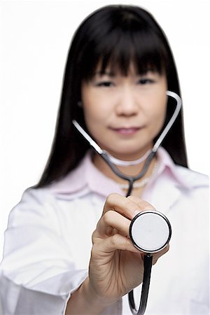 simsearch:656-01766955,k - Doctor with stethoscope, selective focus Foto de stock - Sin royalties Premium, Código: 656-01771493