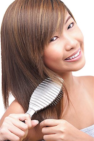 straight hair brushing - Teenage girl brushing her hair Foto de stock - Sin royalties Premium, Código: 656-01771985