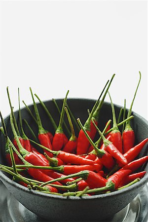 Still life of chilies in bowl Stock Photo - Premium Royalty-Free, Code: 656-01772060