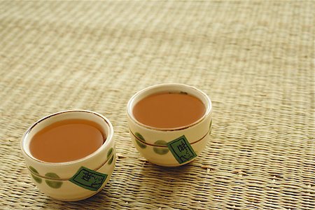 simsearch:656-01772085,k - Still life with two cups of Chinese Tea Stock Photo - Premium Royalty-Free, Code: 656-01772072