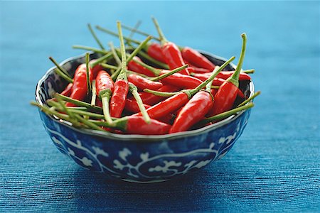 plein (objet) - Still life of chilies in bowl Stock Photo - Premium Royalty-Free, Code: 656-01772081