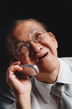simsearch:656-01772656,k - Senior man with mobile phone, looking up Stock Photo - Premium Royalty-Free, Code: 656-01772589