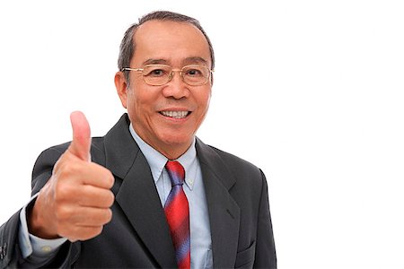 simsearch:656-01772656,k - Businessman looking at camera, making thumbs up sign Stock Photo - Premium Royalty-Free, Code: 656-01772740