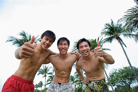 simsearch:656-01765786,k - Three men with arms around each other, smiling at camera Stock Photo - Premium Royalty-Free, Code: 656-01772831