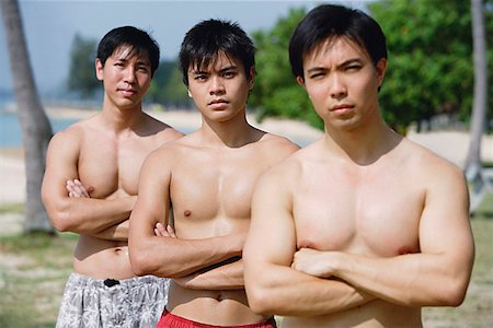simsearch:656-01765624,k - Three men with arms crossed, frowning Stock Photo - Premium Royalty-Free, Code: 656-01772847