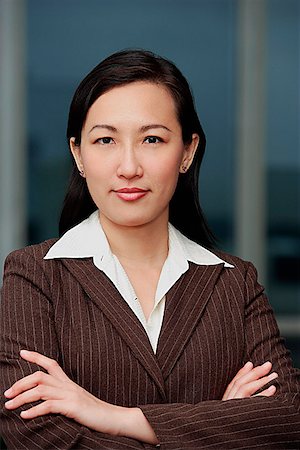 Businesswoman with arms crossed, portrait Stock Photo - Premium Royalty-Free, Code: 656-01772933