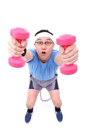 Man using dumbbells, high angle view Stock Photo - Premium Royalty-Free, Code: 656-01773069