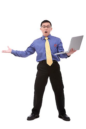 Businessman carrying laptop, looking at camera Stock Photo - Premium Royalty-Free, Code: 656-01773106