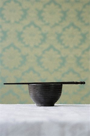 Bowl with chopsticks Stock Photo - Premium Royalty-Free, Code: 656-01828908