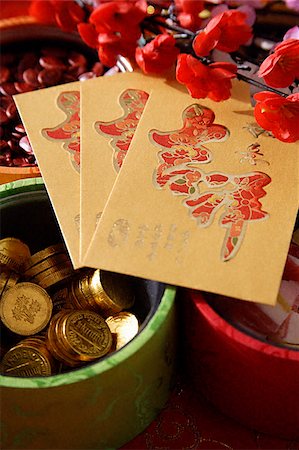 peach blossoms - Still life of Chinese new year goodies Stock Photo - Premium Royalty-Free, Code: 656-02660261