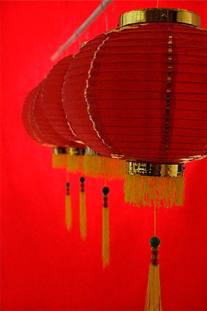 Still life of a row of red lanterns Stock Photo - Premium Royalty-Free, Code: 656-02660274