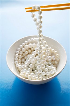 palillo (oriental) - string of pearls on chopstick Foto de stock - Sin royalties Premium, Código: 656-02702806