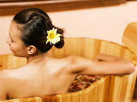 exotic relaxing - back view relaxing in wooden tub Stock Photo - Premium Royalty-Free, Code: 656-02879747