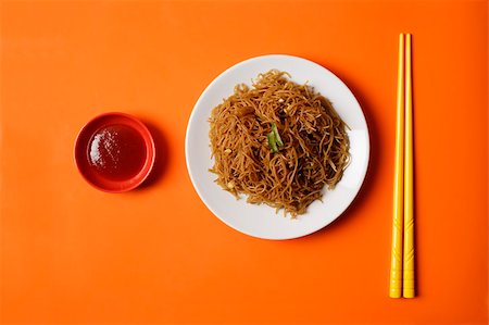 empty plate of food - Noodles on plate with chopsticks. Stock Photo - Premium Royalty-Free, Code: 656-03076215