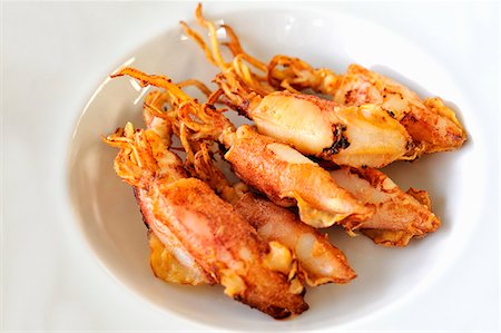 Fried cuttlefish Foto de stock - Sin royalties Premium, Código: 659-06154174