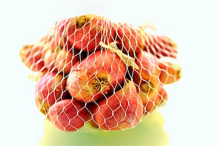 pack - Shallots in a net Stock Photo - Premium Royalty-Free, Code: 659-06154181