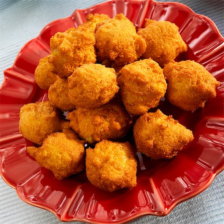 simsearch:659-06901558,k - Hush Puppies on a Red Plate Stock Photo - Premium Royalty-Free, Code: 659-06154201