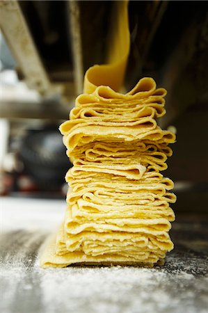 Fresh Sheets of Pasta Being Made Stock Photo - Premium Royalty-Free, Code: 659-06154238