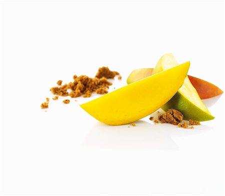 Mango and brown sugar (ingredients for a mango and rum cocktail) Stock Photo - Premium Royalty-Free, Code: 659-06154275