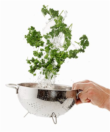 simsearch:659-06494295,k - Parsley being washed Stock Photo - Premium Royalty-Free, Code: 659-06154339