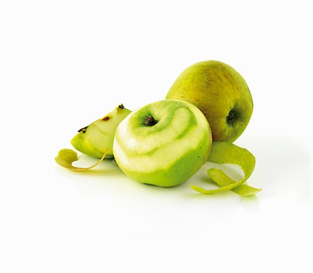 Apple, partially peeled Stock Photo - Premium Royalty-Free, Code: 659-06154438