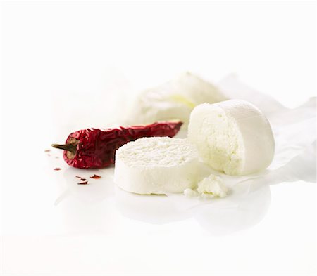 Goat cheese and dried chili peppers Stock Photo - Premium Royalty-Free, Code: 659-06154455