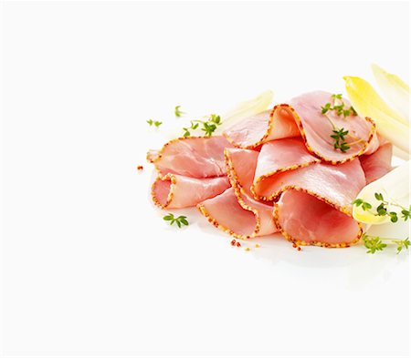 raw sausage - Boiled ham with a mustard crust, sliced Stock Photo - Premium Royalty-Free, Code: 659-06154489