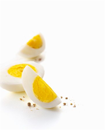 Hard boiled egg and pepper Foto de stock - Sin royalties Premium, Código: 659-06154532