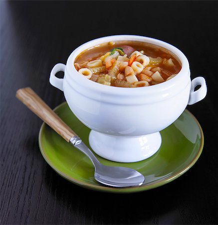 soup plate - Bowl of Minestrone Soup on a Green Plate with Spoon Stock Photo - Premium Royalty-Free, Code: 659-06154591