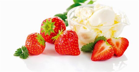 strawberry and vanilla ice cream - A bowl of vanilla ice cream and fresh strawberries Stock Photo - Premium Royalty-Free, Code: 659-06154648