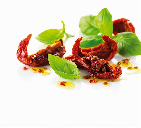 dried herbs - Dried tomatoes and fresh basil Stock Photo - Premium Royalty-Free, Code: 659-06154657