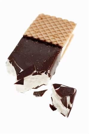 simsearch:659-06154739,k - Ice cream sandwich with a bite taken out Fotografie stock - Premium Royalty-Free, Codice: 659-06154745