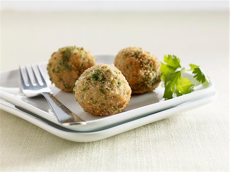 fryed - Three risotto cheese dumplings Stock Photo - Premium Royalty-Free, Code: 659-06154792