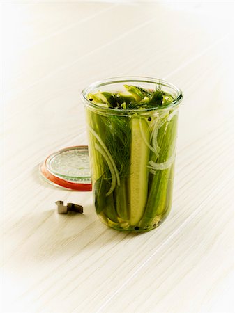 pickling gherkin - Homemade dill gherkins in an open jar Stock Photo - Premium Royalty-Free, Code: 659-06154814