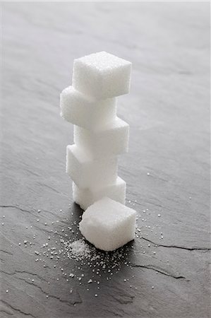 A stack of sugar cubes Foto de stock - Sin royalties Premium, Código: 659-06154878
