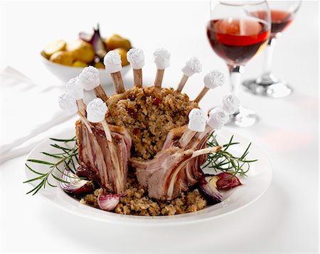 simsearch:659-06307688,k - A lamb crown with a cranberry, herb and bread stuffing Stock Photo - Premium Royalty-Free, Code: 659-06154892