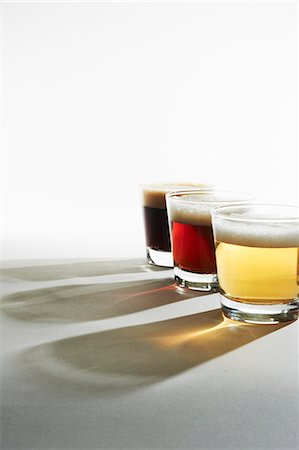 Three Glasses of Beer from Light to Dark Stock Photo - Premium Royalty-Free, Code: 659-06154969